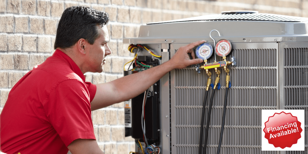 Nate Certified Bryant Tech Providing Fall Tune-Up and Maintenance to a heating and cooling system in Palm Harbor